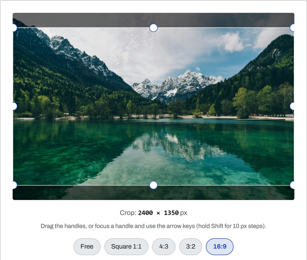 Image Cropper with a mountain lake photo loaded and the 16:9 preset selected, cropping the 2400 × 1600 image to 2400 × 1350 pixels.